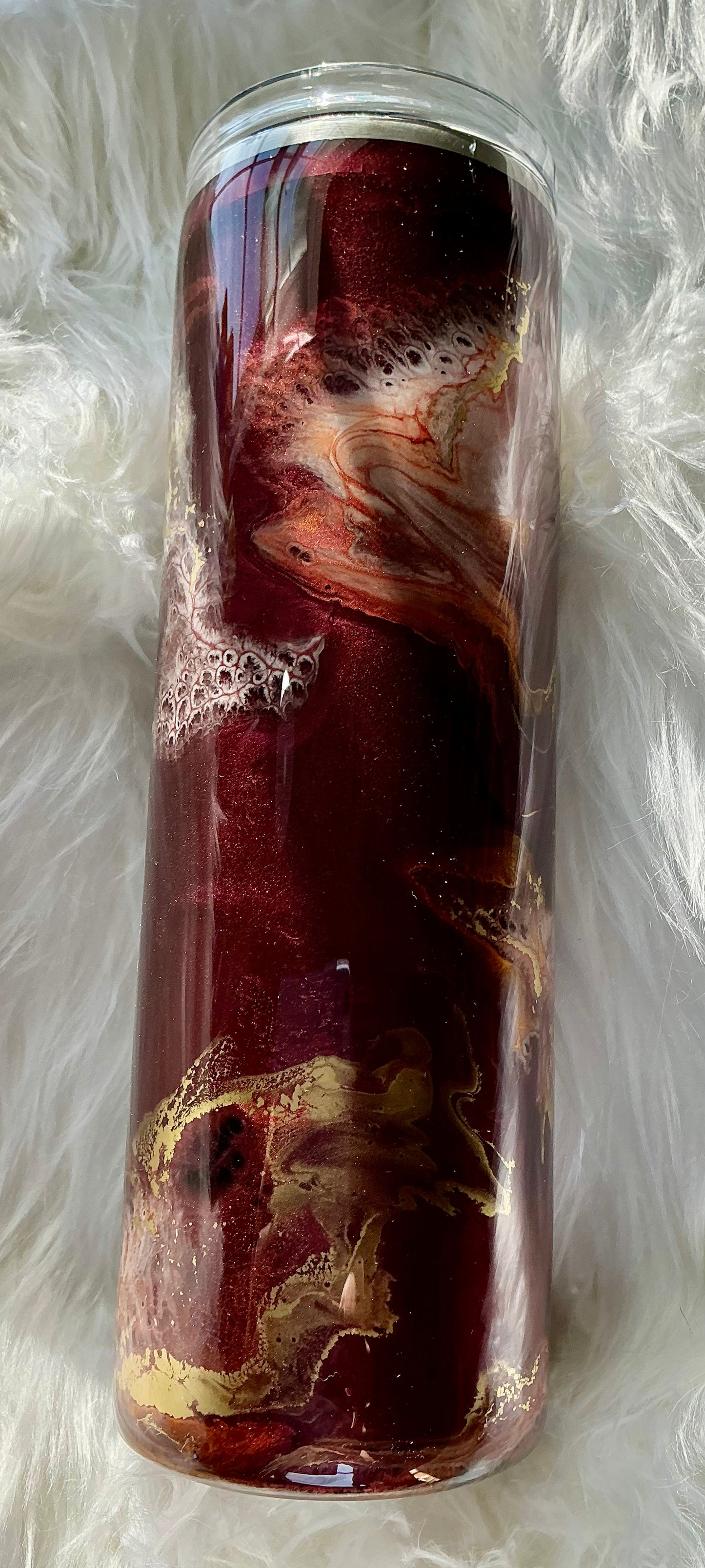 #67. 30 oz Skinny with a Burgundy Base, Orange and White Inks with Celling