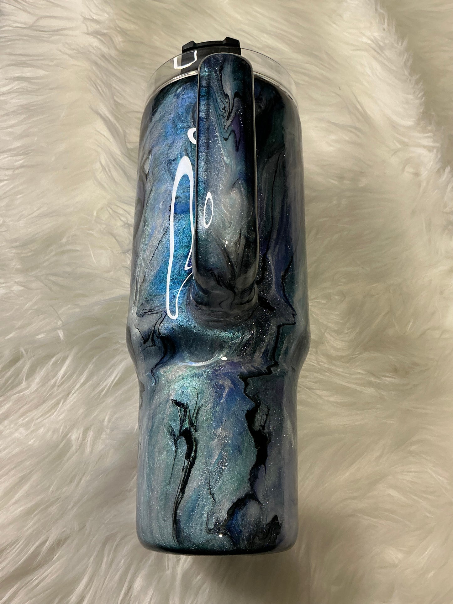 #653. 40 oz Not All Who Wander Are Lost: in a Abalone with Blues, Greens, & Purple