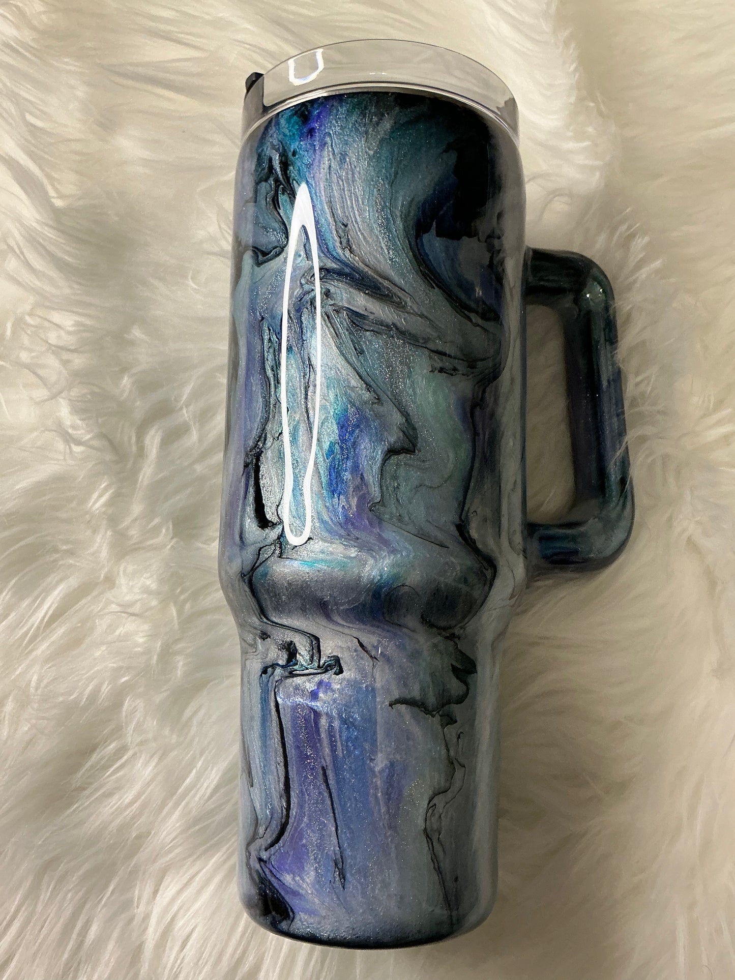 #653. 40 oz Not All Who Wander Are Lost: in a Abalone with Blues, Greens, & Purple