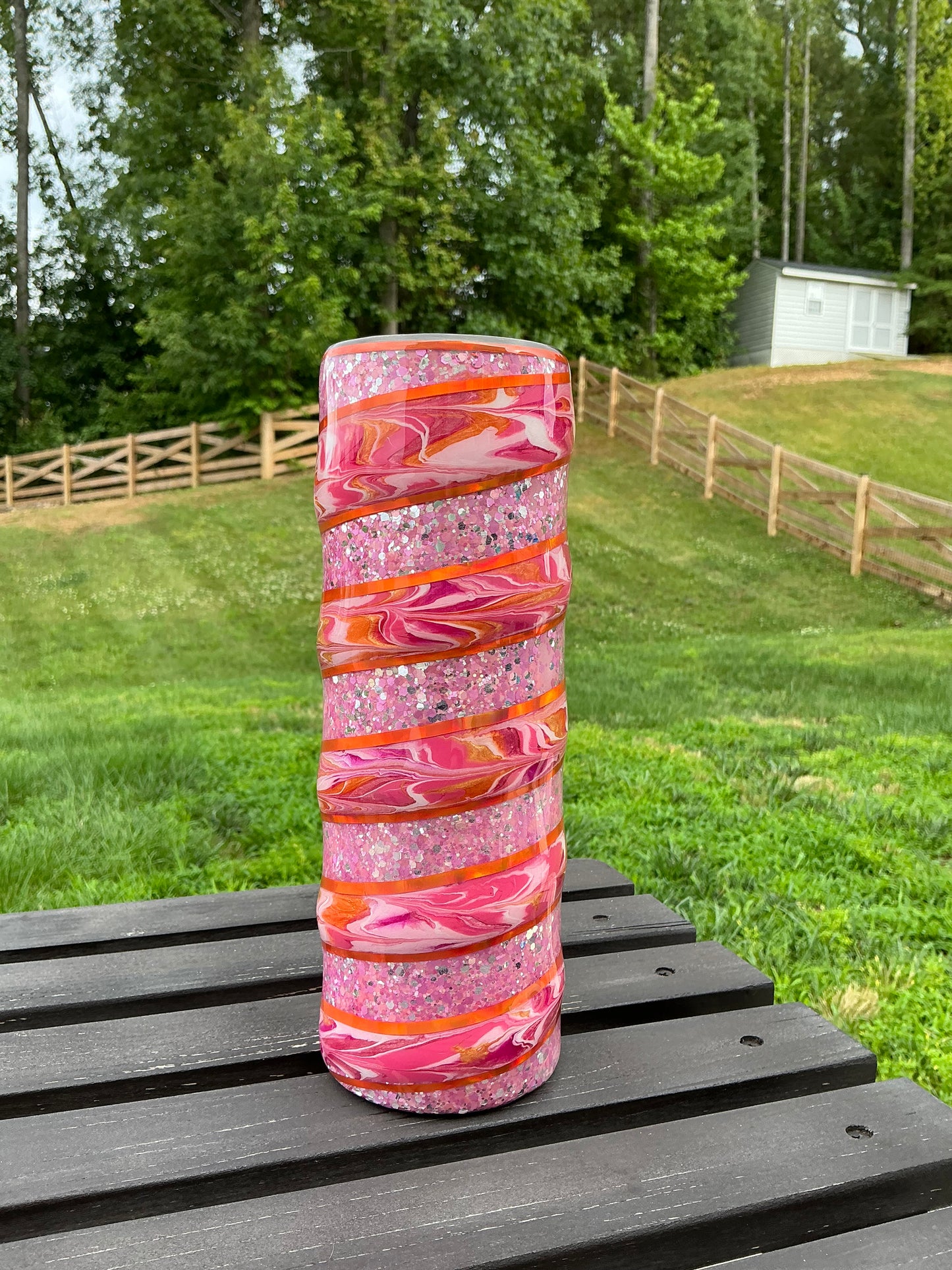 30 oz skinny tumbler with a Pink Glitter Base & Pink, Orange & Coral Swirl