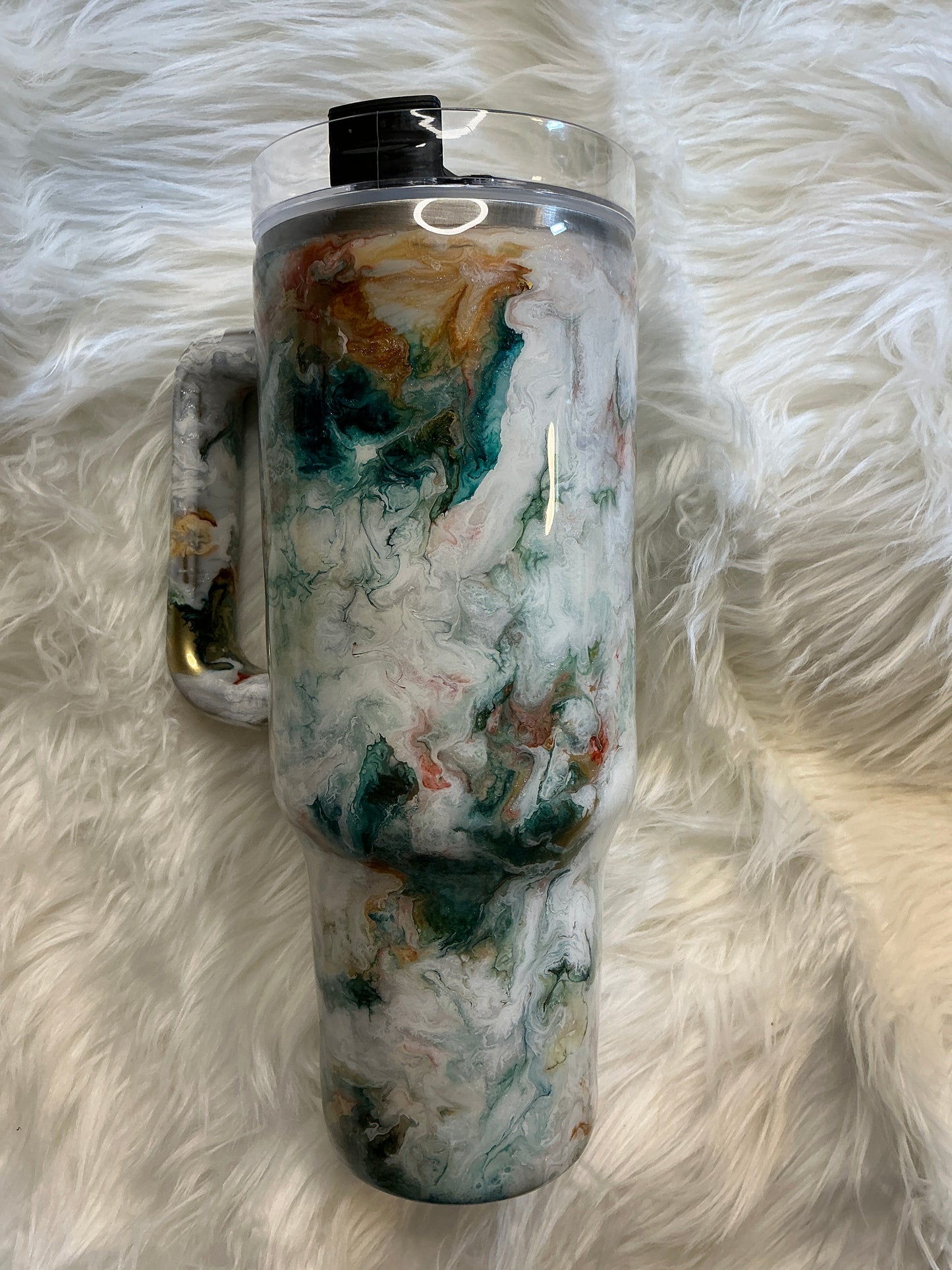 #1.    40 oz Traveler in a Western Marble Technique