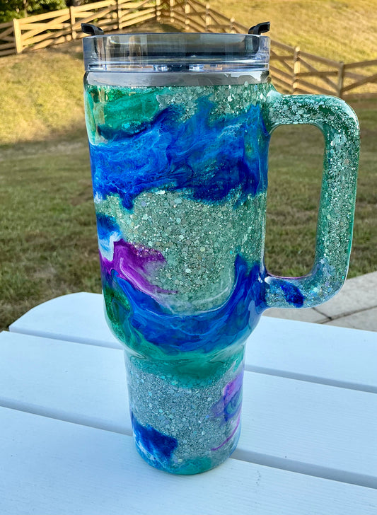 #714. 40 oz Glitter Hombre Base With Ink Swirl