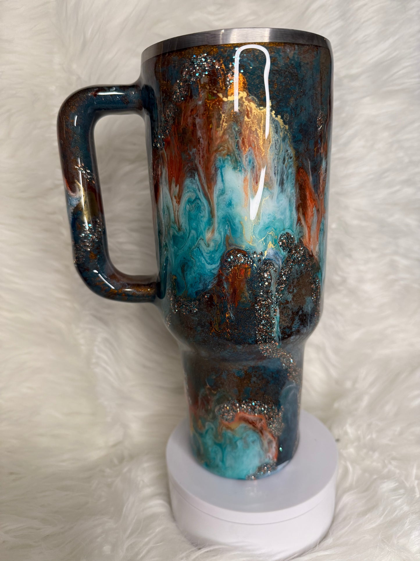 #704.  40 oz Traveler in a blue Patina with a Western Ink Swirl with Foil Accents