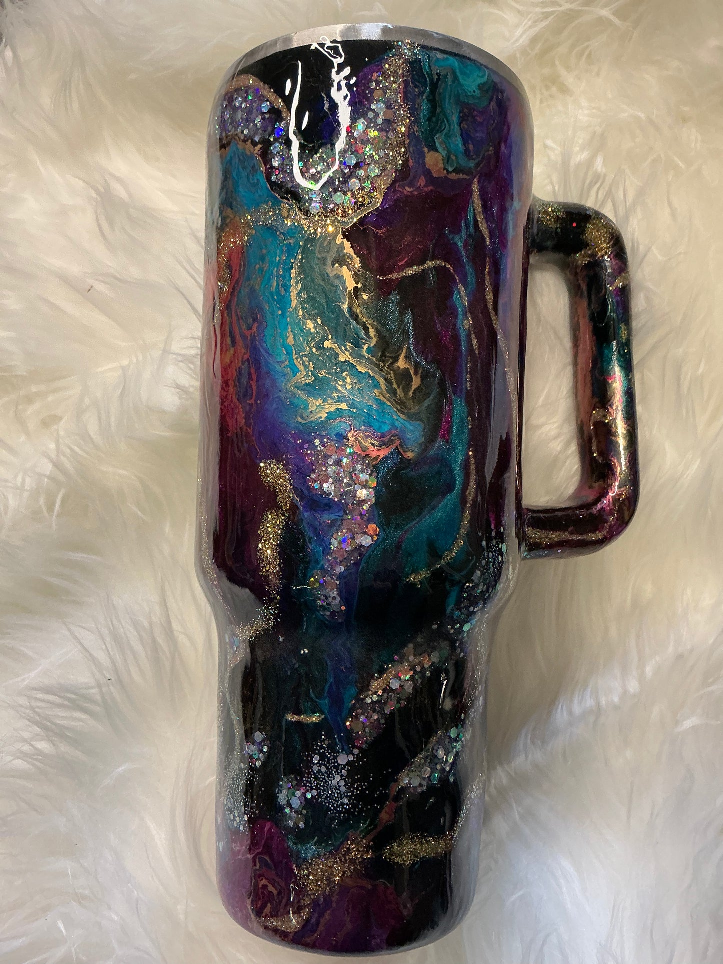 #615.   40 oz Traveler  in a Jewel Tone Suspension